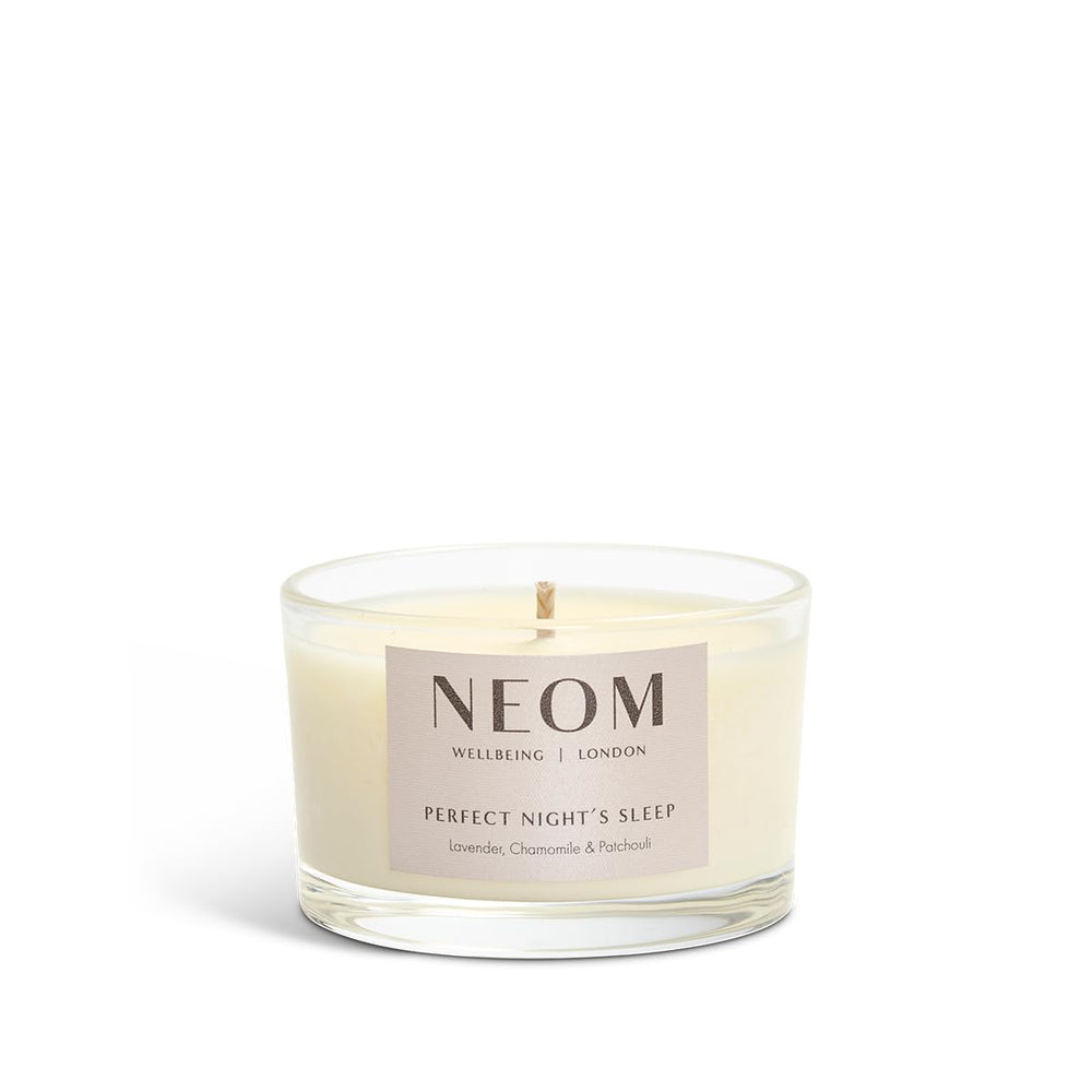 Front view of NEOM travel candle jar with label