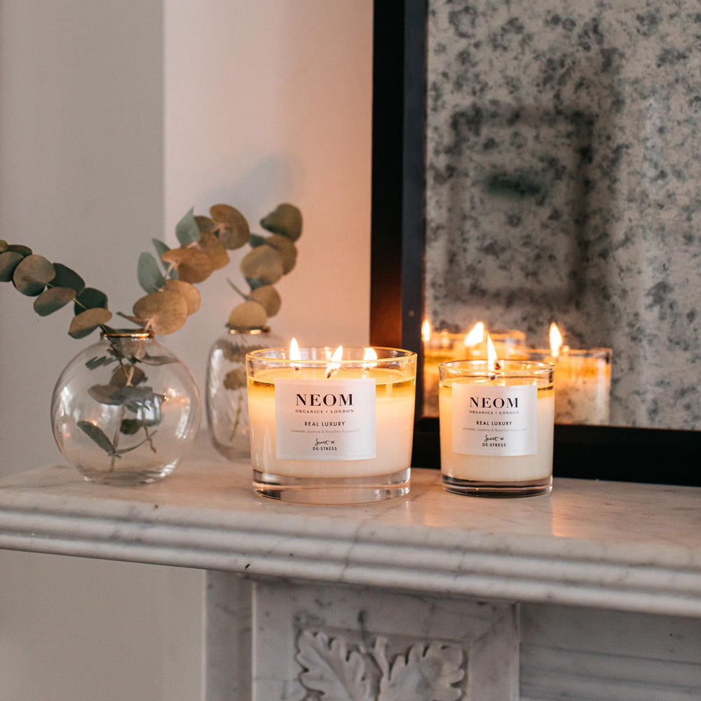 NEOM Real Luxury candle UK hand-poured jar on display.