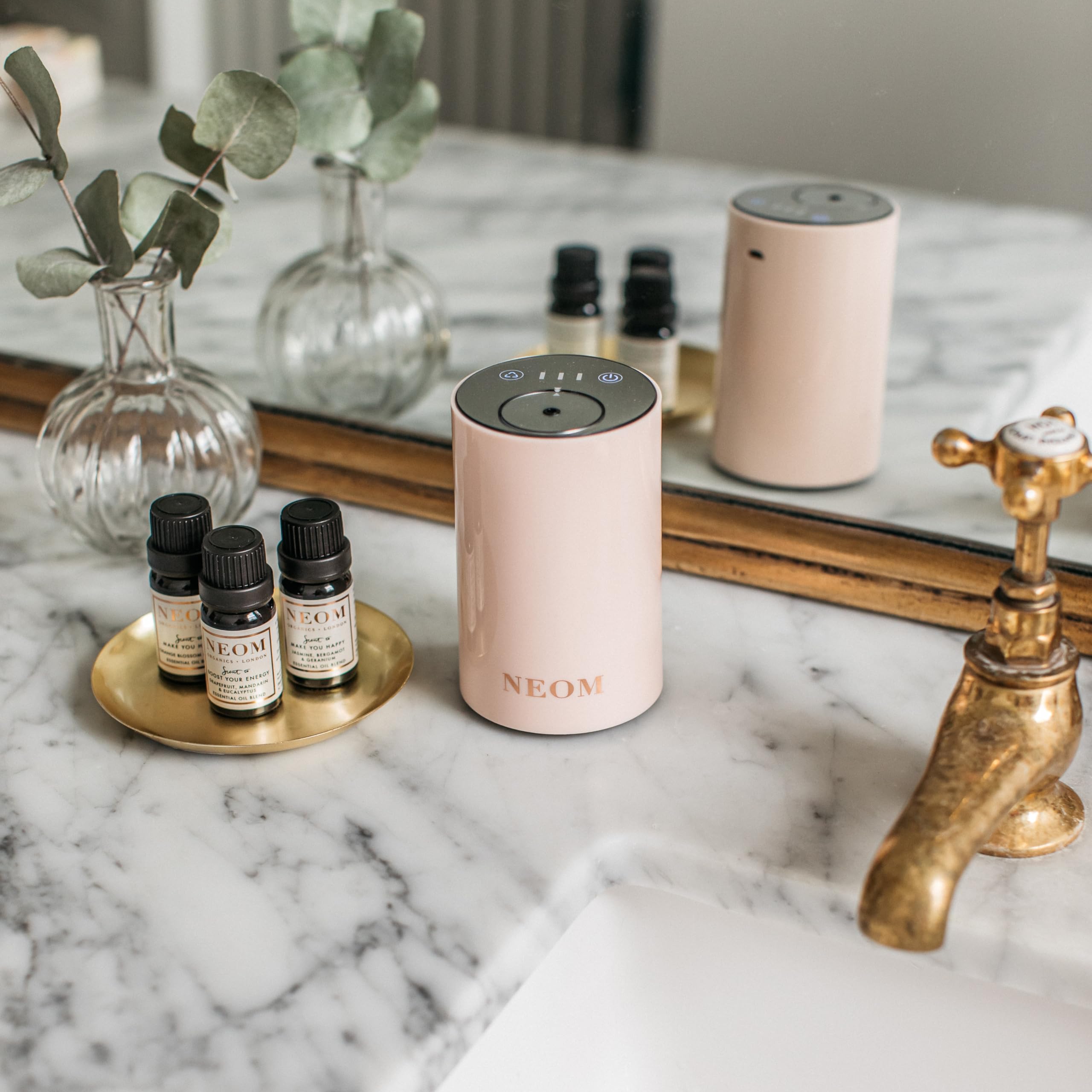 NEOM Wellbeing Pod Mini waterless diffuser showing clean, heat-free aroma diffusion