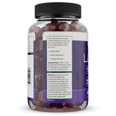 Open bottle with gummies next to a glass of water for bedtime routine