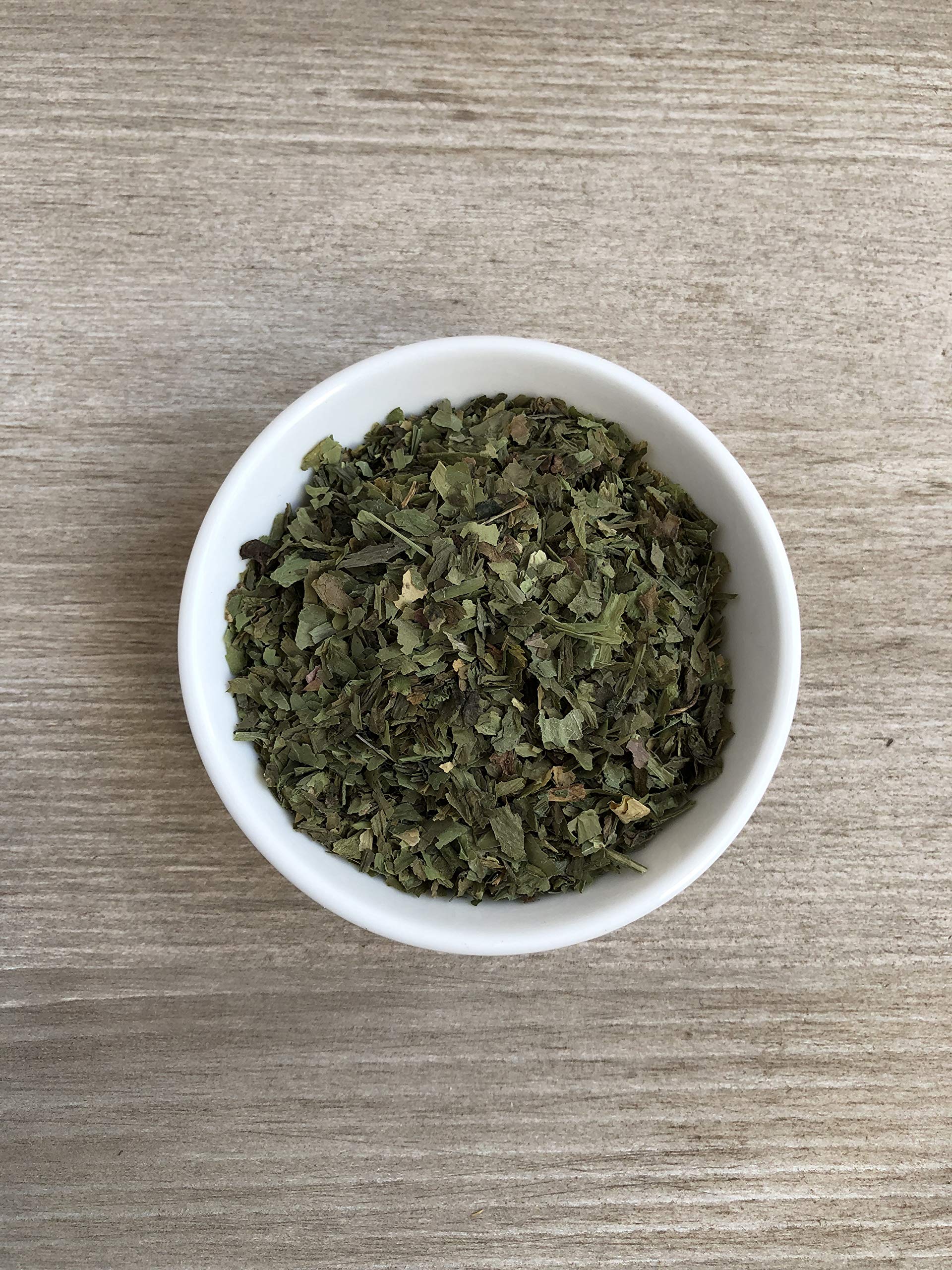 Herbal nettle tea ready to brew from organic nettle leaves