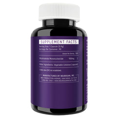 Close-up of NMN capsules showing 900 mg per serving
