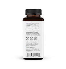 Close-up of NeuroQ Daily Essentials tablets beside the bottle