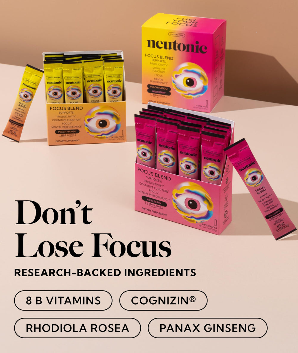 Neutonic Wild Berry stick-pack beside water for study sessions