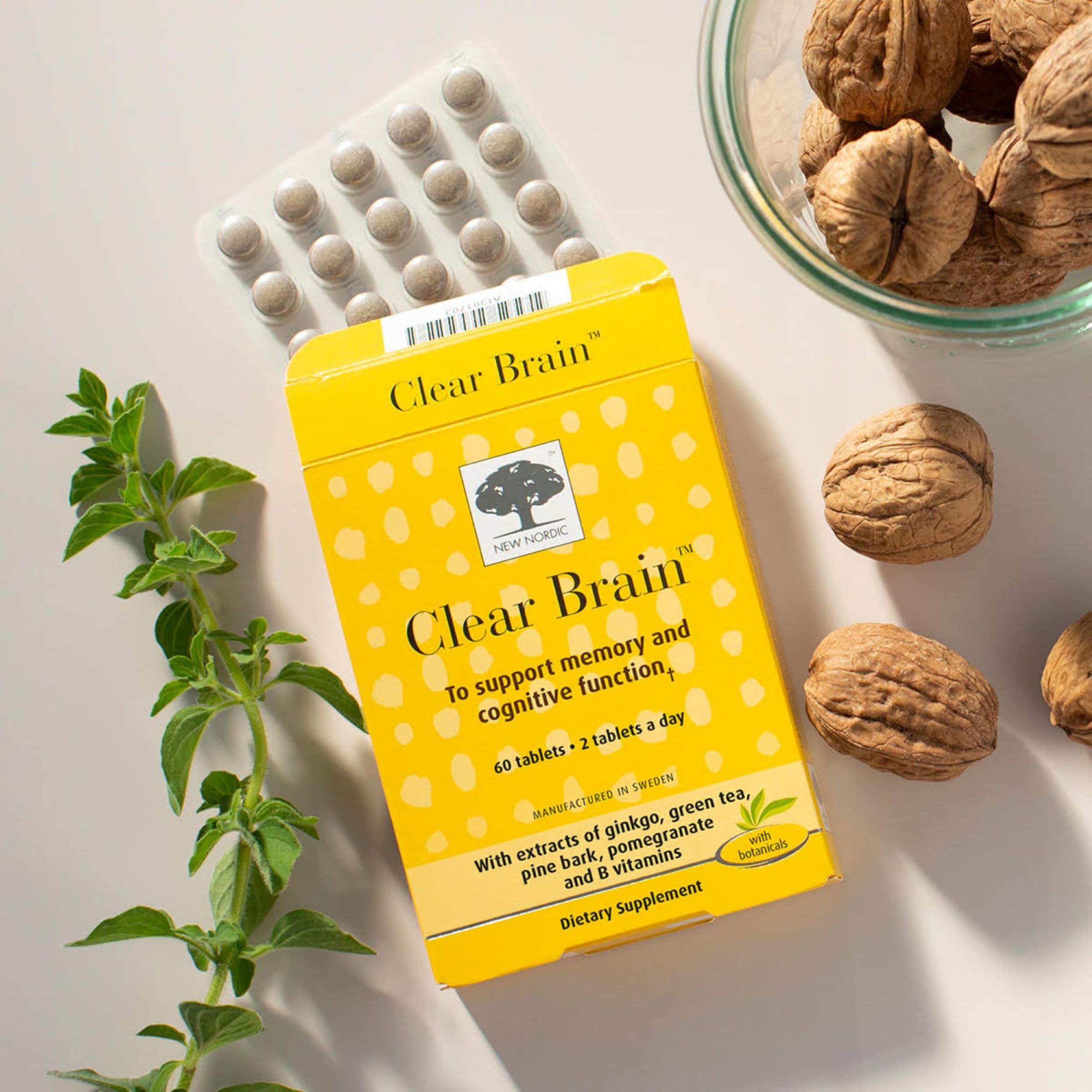 Adult taking Clear Brain capsules for cognitive health