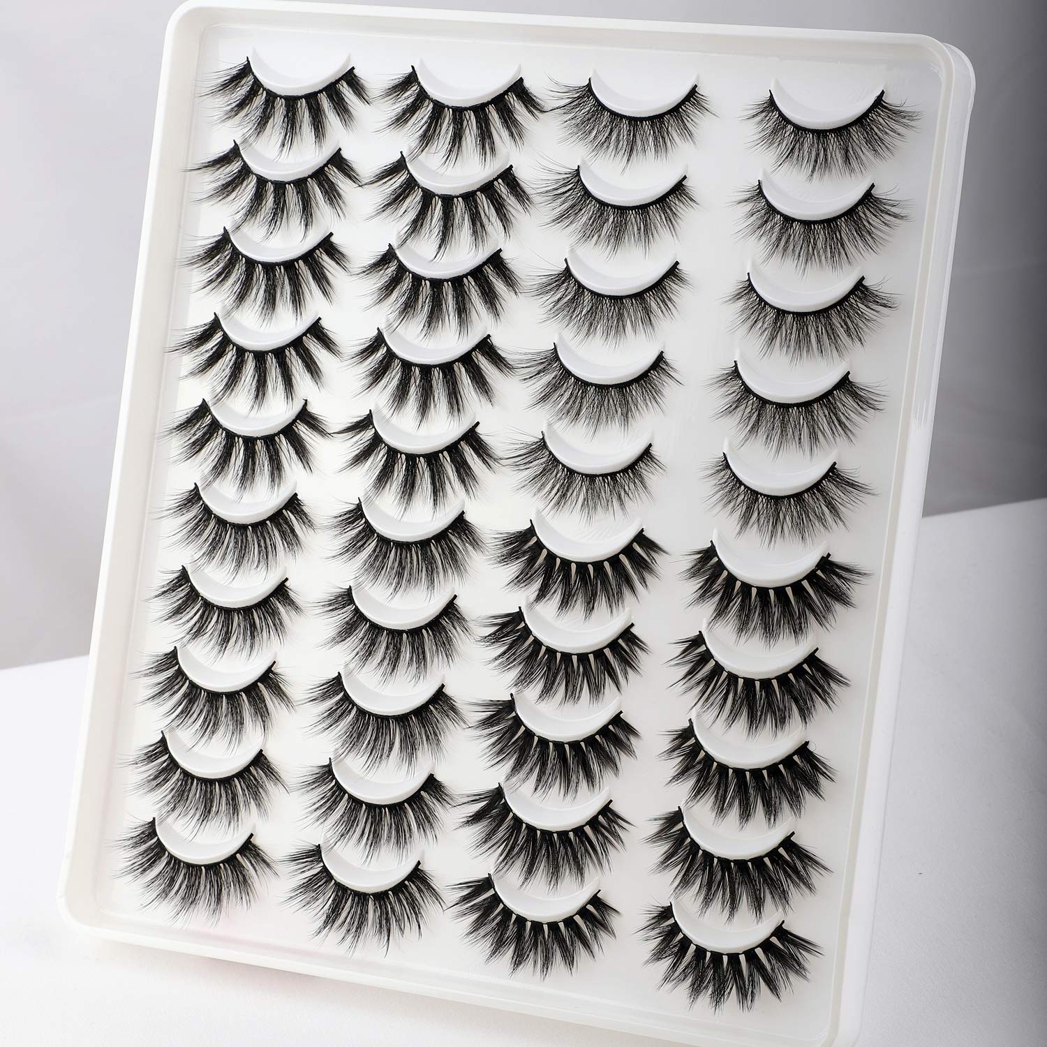 Newcally 3D multi-layer lashes with voluminous, wispy effect.