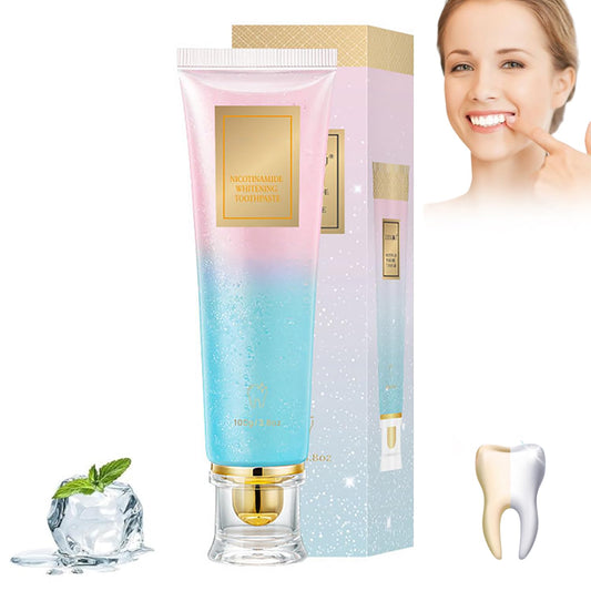 Front view of Niacinamide Toothpaste tube with mint leaves