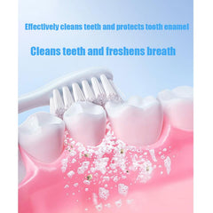 Toothbrush applying whitening toothpaste on teeth