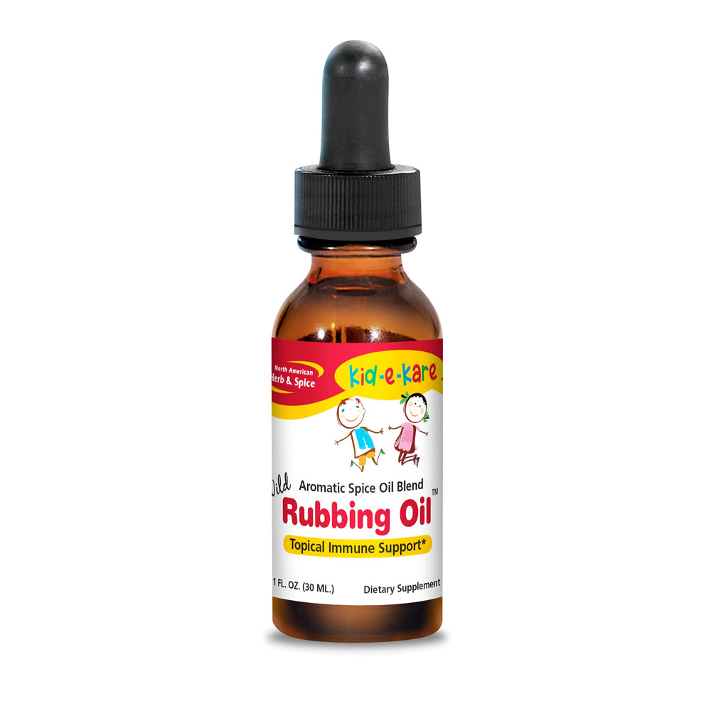 North American Herb & Spice Kid-e-kare rubbing oil bottle close-up for comforting topical use.