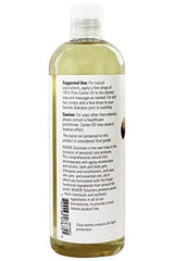Close-up of bottle pour spout with castor oil