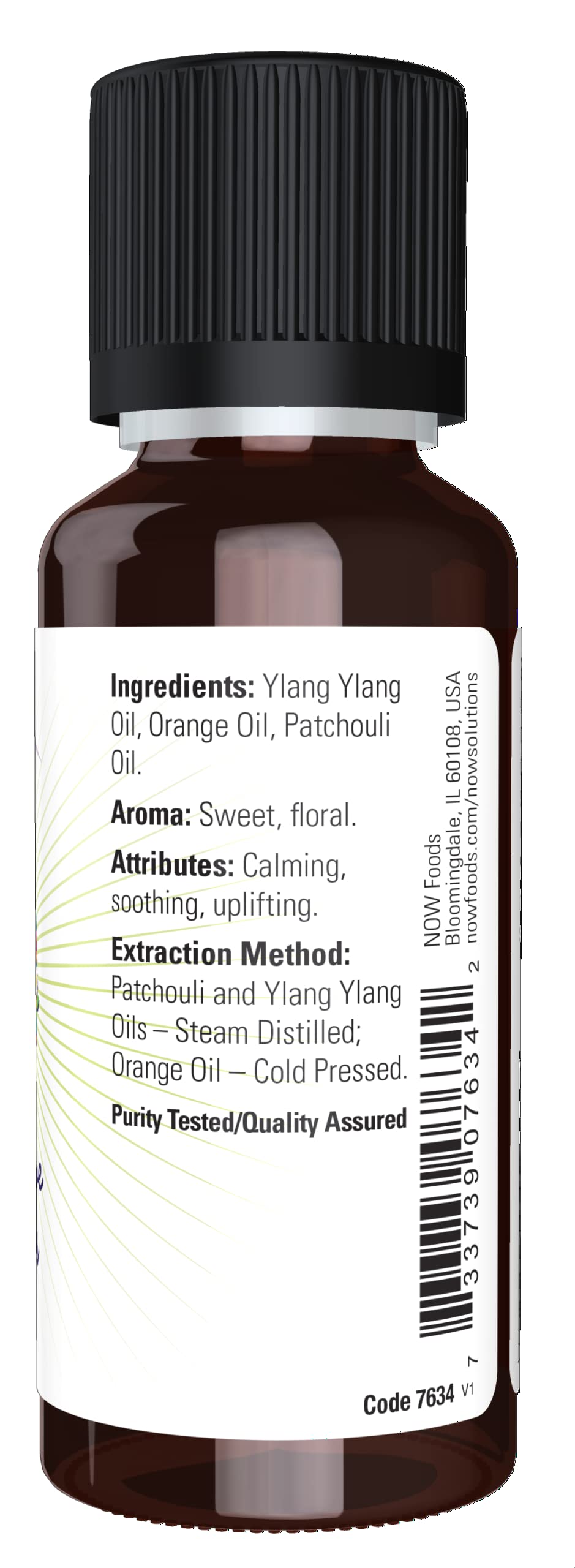 Close-up of Peace Love and Flowers essential oil bottle