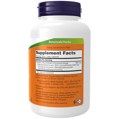 Turmeric roots and powder illustrating curcumin source