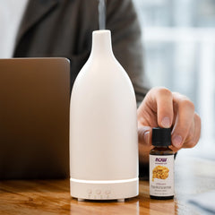 Child-resistant cap on frankincense essential oil bottle