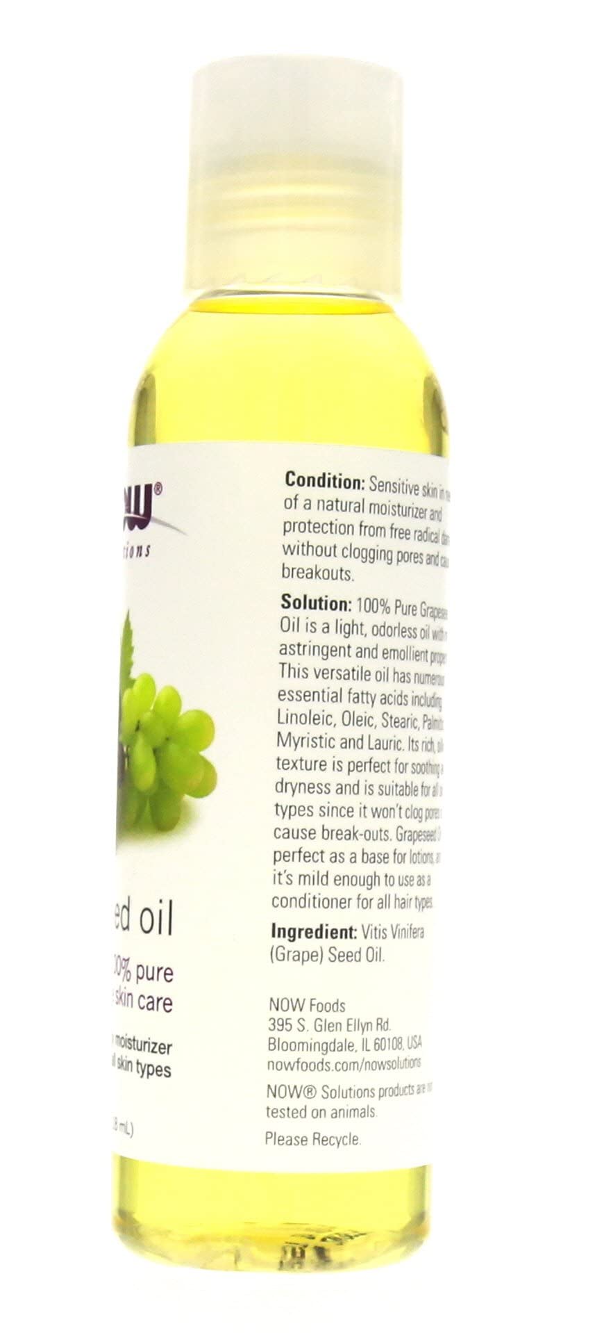 NOW Grape Seed Oil label closeup shows 100% pure quality.