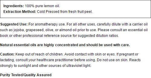 Close-up of lemon essential oil bottle