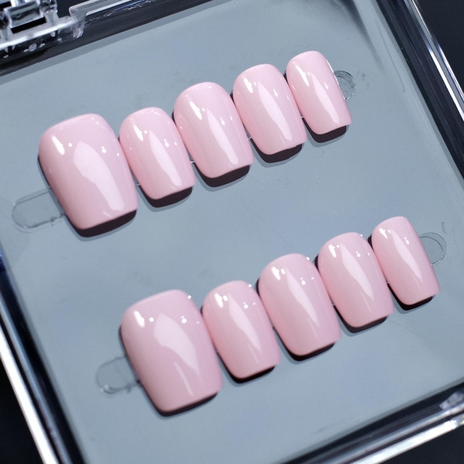 NSSHEL manicure kit contents shown with nails for easy home application.