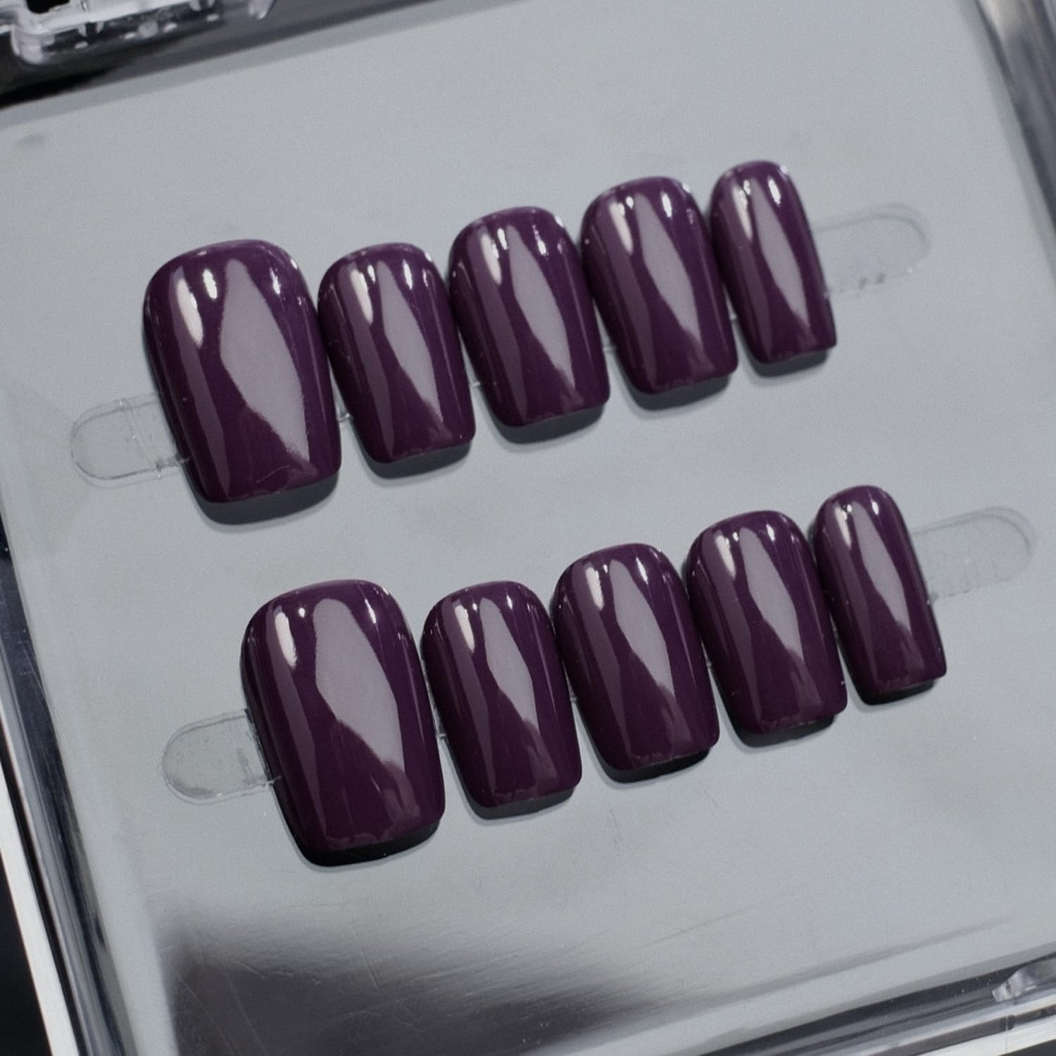 NSSHEL Purple press-on nails solid color close-up showing glossy finish