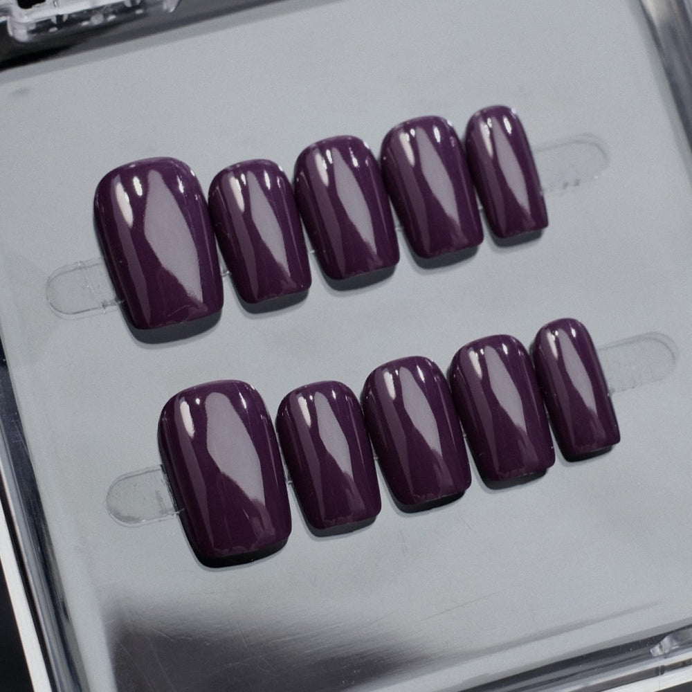 NSSHEL Purple press-on nails solid color close-up showing glossy finish