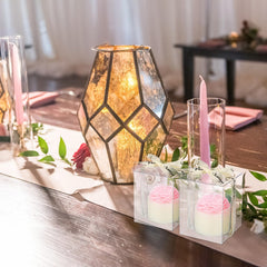 Nuanchu lavender notes capture soothing scent in a floral candle.