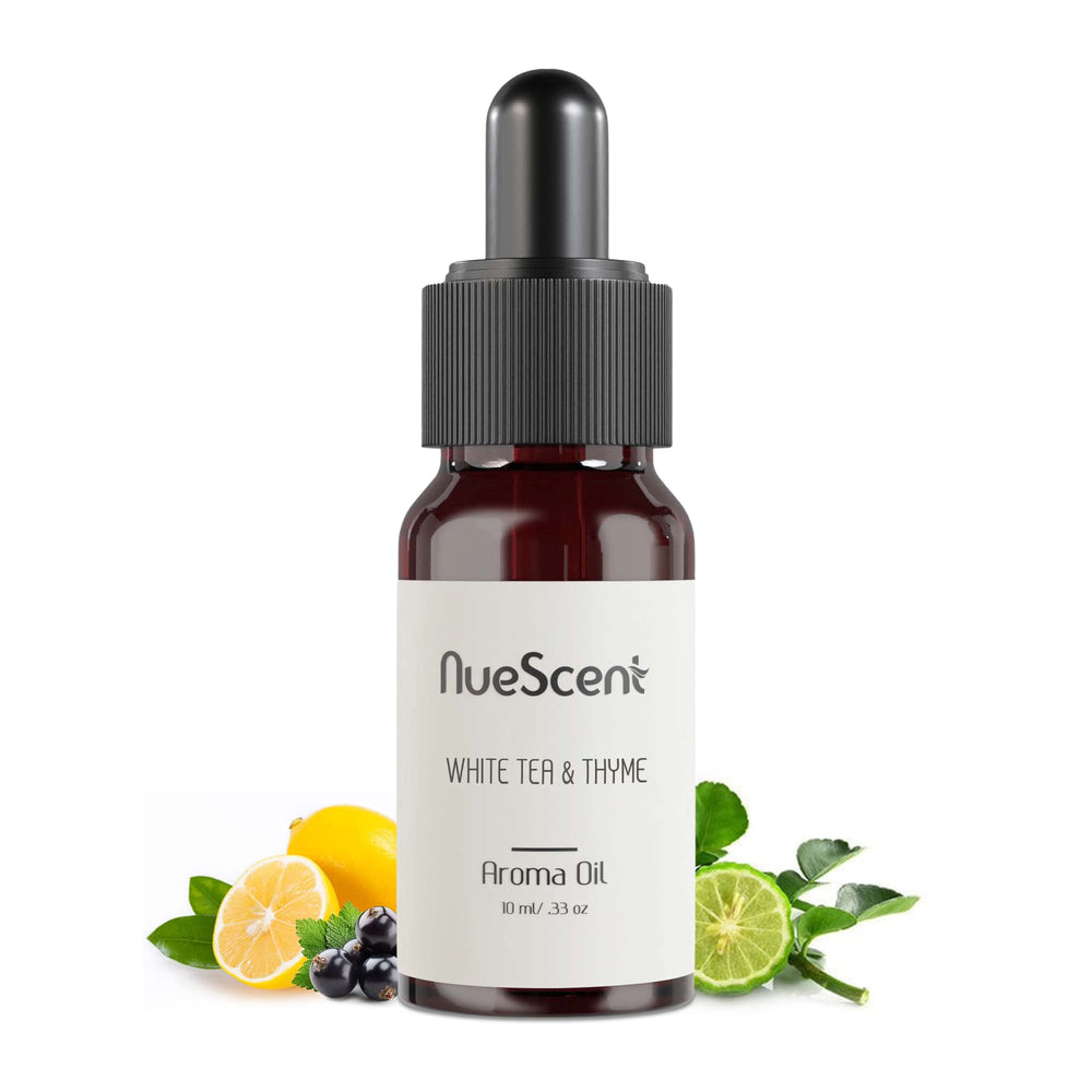 NueScent White Tea & Thyme oil bottle shows premium vegan fragrance for diffusers with long-lasting aroma.