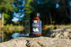 Sealed bottle of Black Turmeric capsules with label