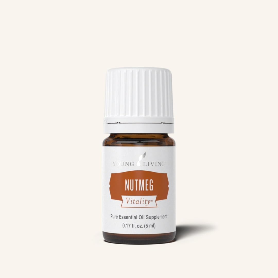 Young Living Nutmeg Vitality amber oil bottle signals premium culinary use.