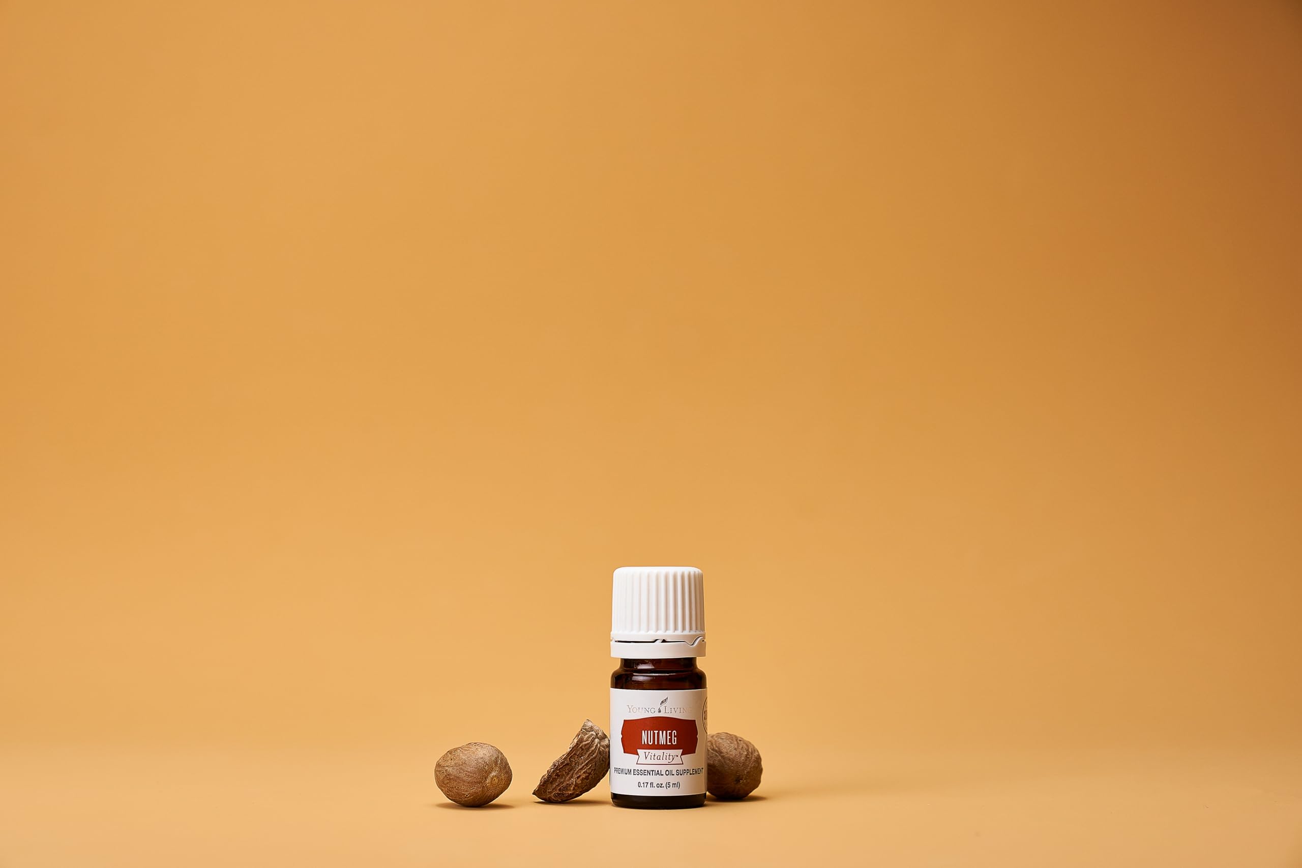 Young Living Nutmeg Vitality bottle label closeup shows premium-quality cooking oil.