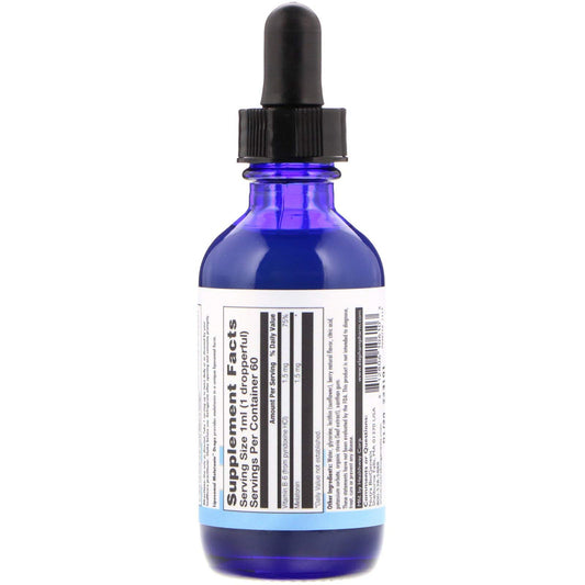 Close-up of Liposomal Melatonin liquid tincture dropper releasing droplets