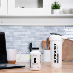 Capsules close-up of NutraBio Vitamin C with Rose Hips - image 1