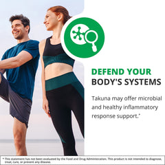Glass of water with NutraMedix Takuna Blanca liquid supplement