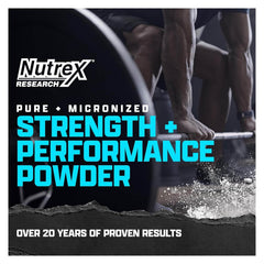 Creatine monohydrate powder dissolved in water in a glass