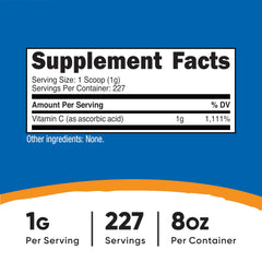 Close-up of powder scoop showing 1-gram serving