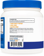 Serving scoop next to Nutricost L-Arginine Complex bottle