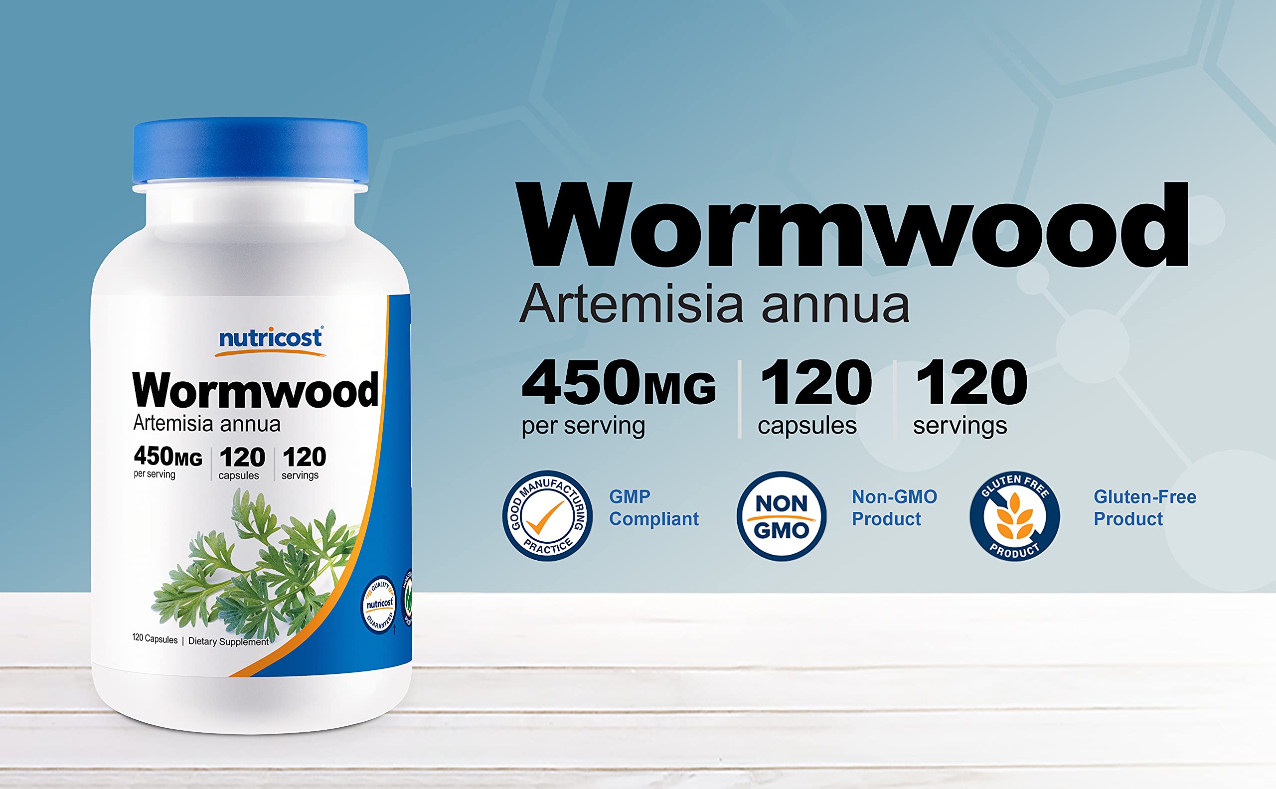 Wormwood capsules spilled on white background