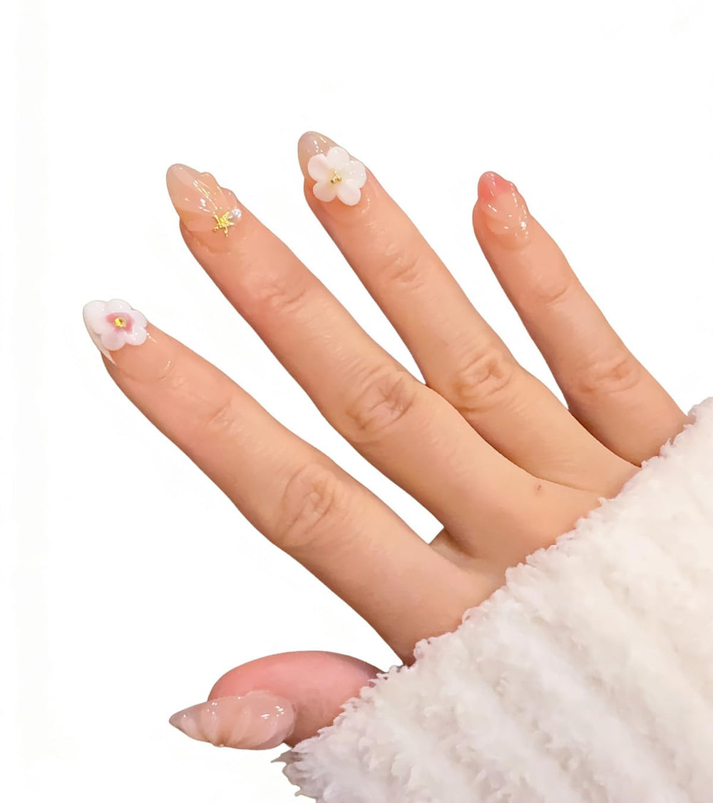Ocean A04 nails feature 3D florals and starfish accents for coastal flair