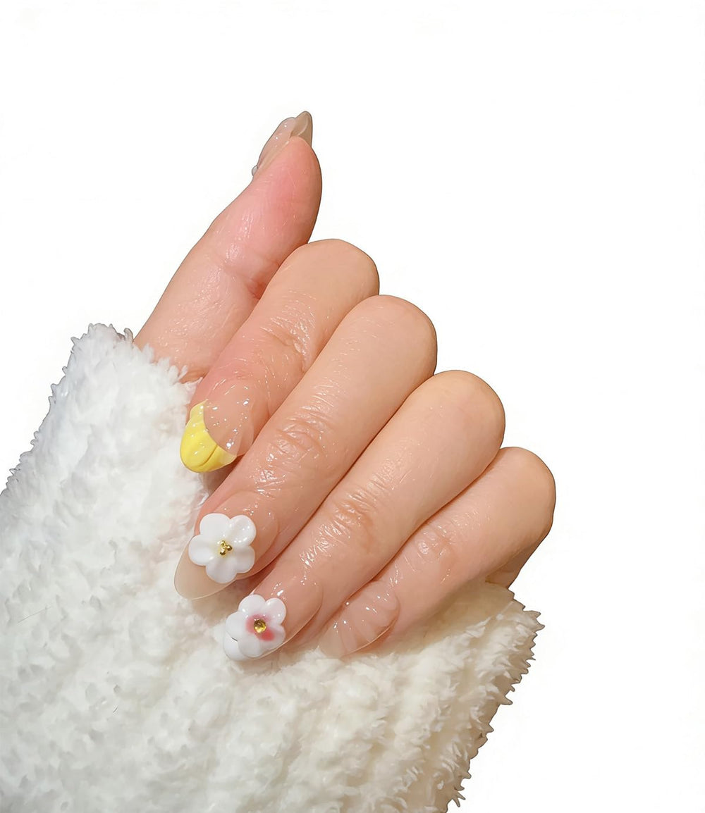 Ocean A04 nails show soft pink gradient and delicate flower details