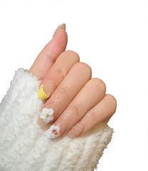 Ocean A04 nails show soft pink gradient and delicate flower details