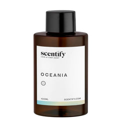 Close-up of Oceania aroma oil refill showing white tea and lavender notes