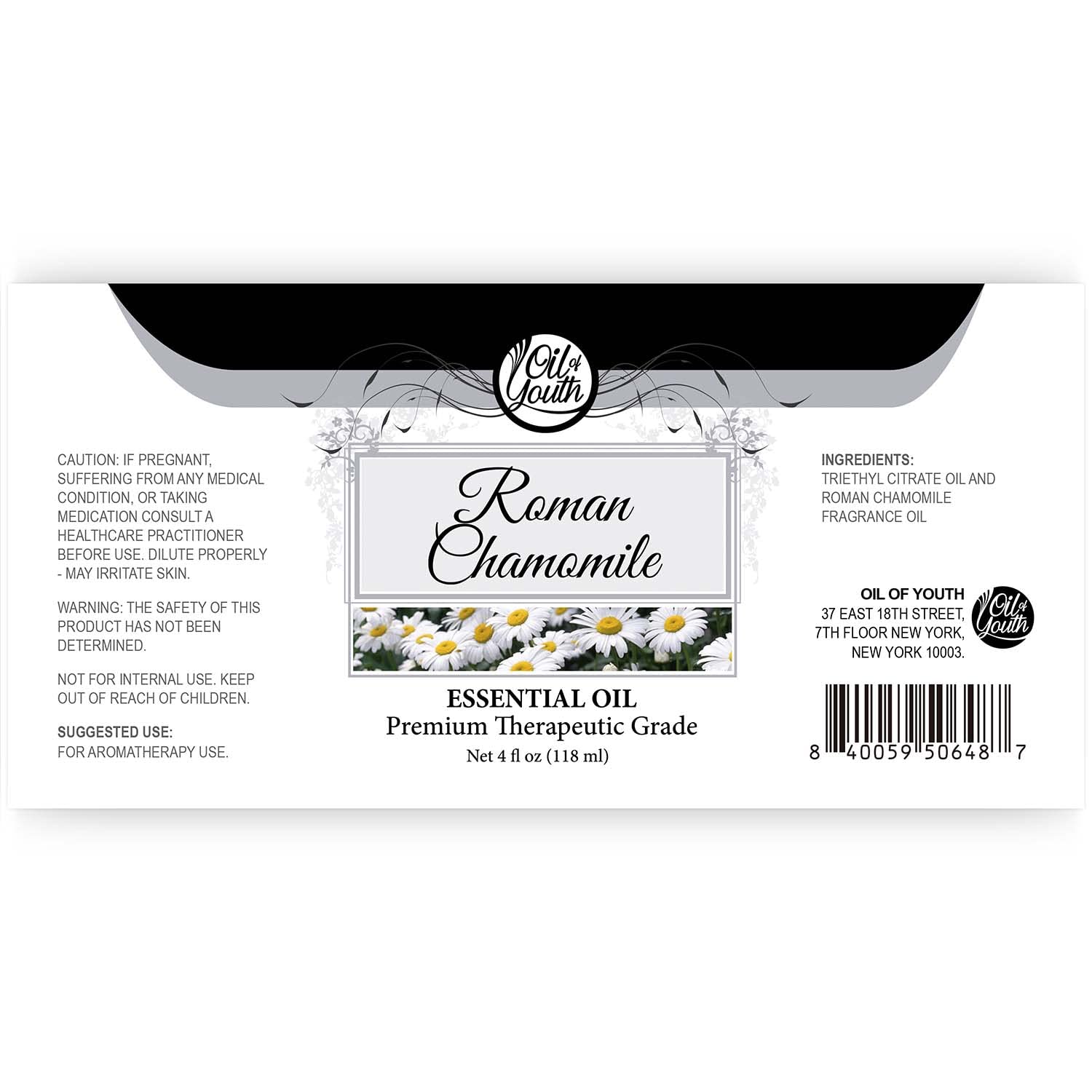 Close-up of Oil of Youth Roman Chamomile essential oil label