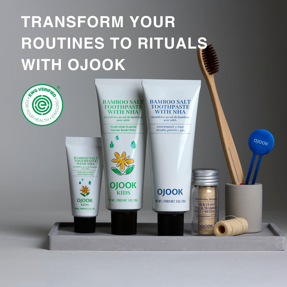 Lifestyle shot with toothpaste and toothbrush in a clean bathroom