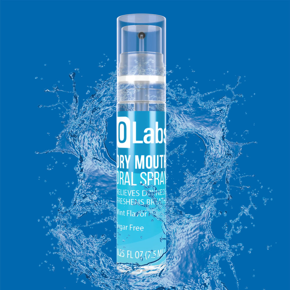 Two travel-size Olabs Dry Mouth Spray bottles