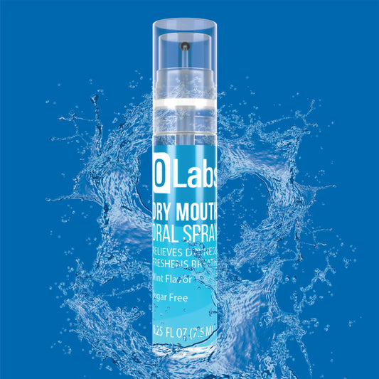 Two travel-size Olabs Dry Mouth Spray bottles