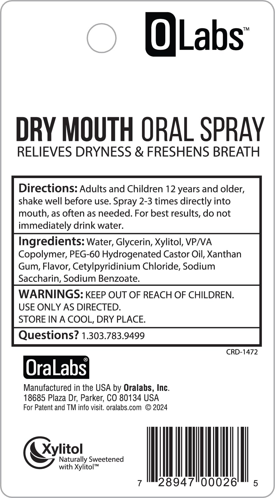 Hands using Olabs Dry Mouth Spray to spray into the mouth