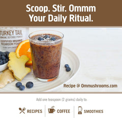 Open jar with powder and scoop ready for use