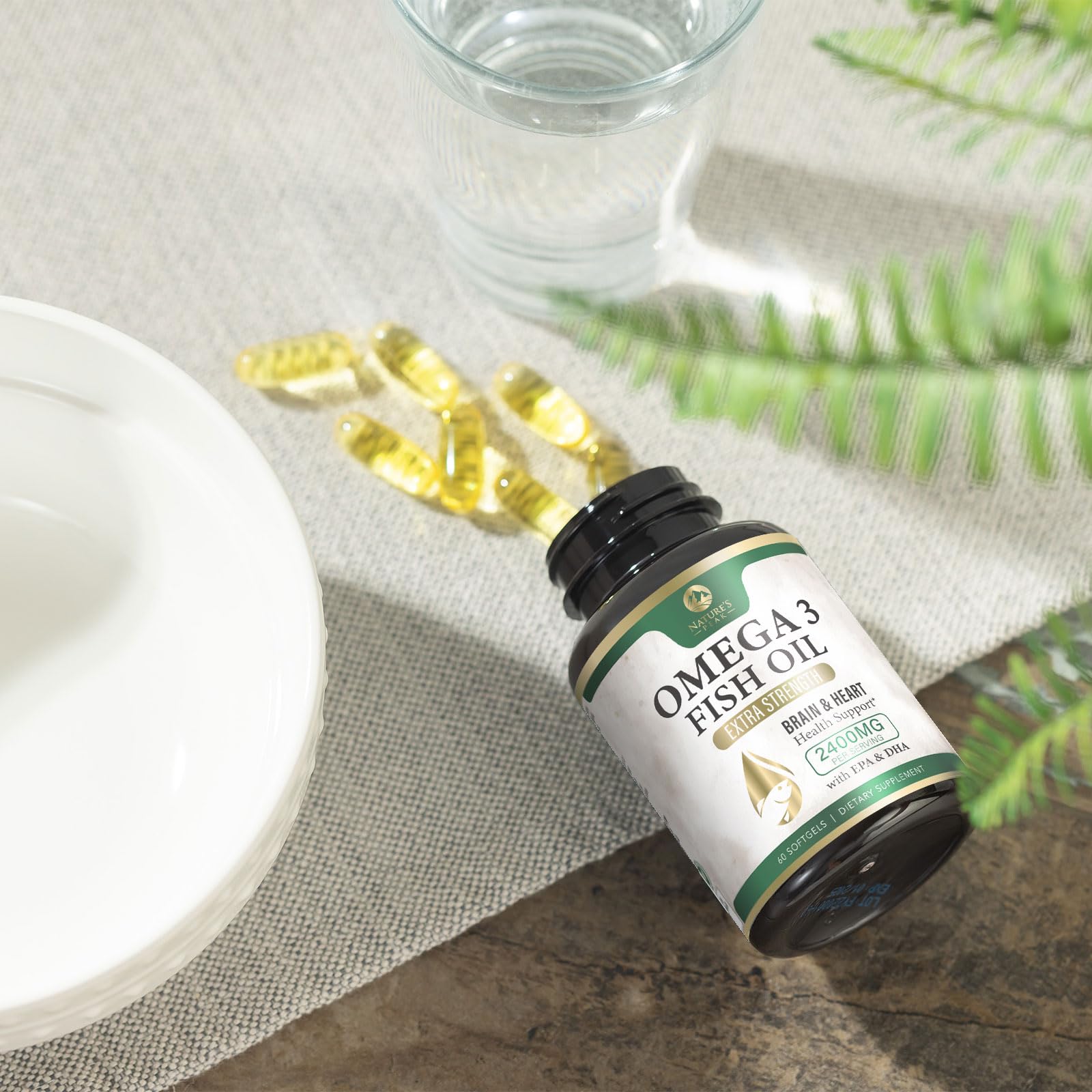 Lifestyle scene with omega 3 bottle and lemon