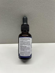 Omega 3-6-9 oil drops 4-pack bottle label close-up