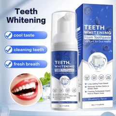 Toothbrush with coated foam toothpaste
