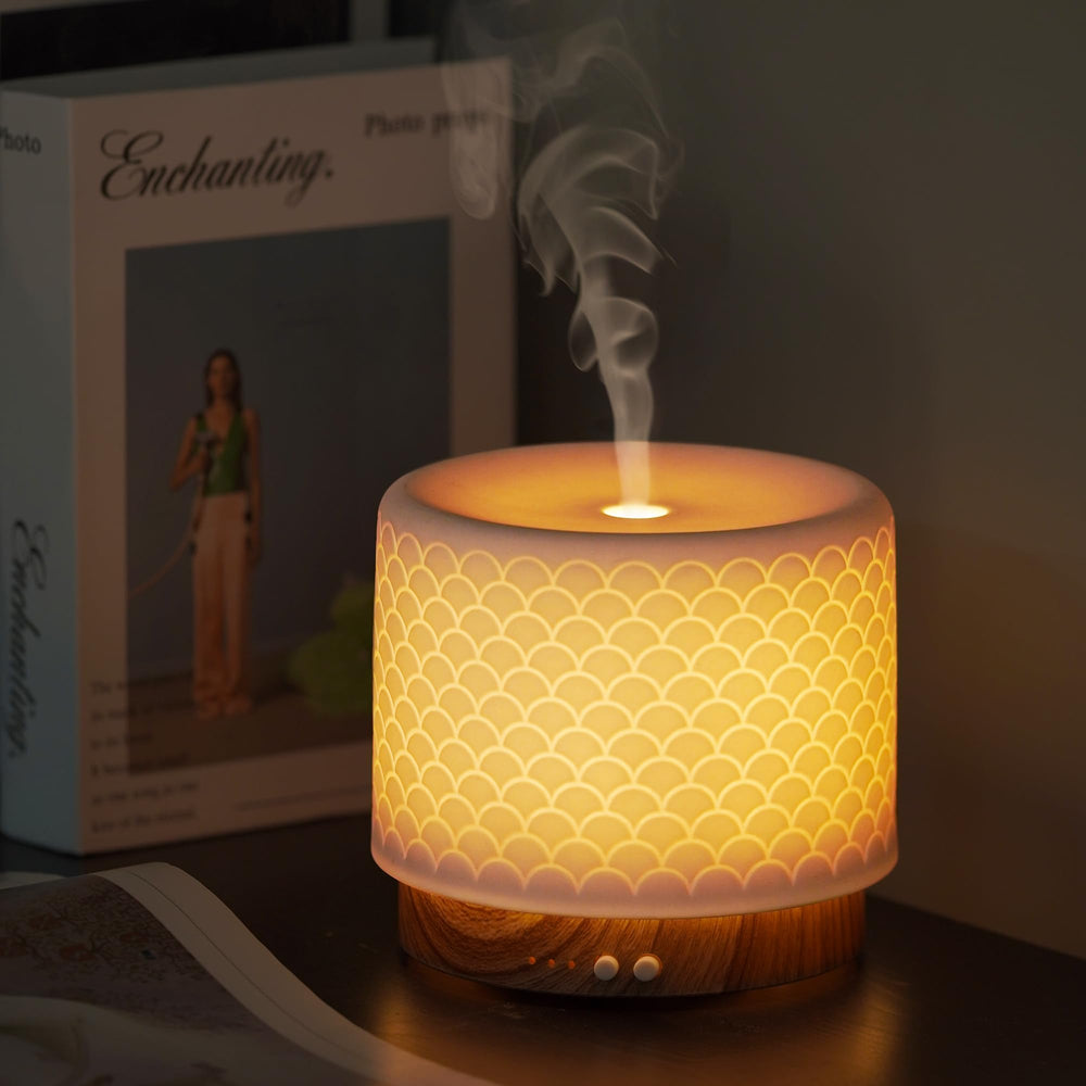 Onaboviva mermaid-inspired ceramic diffuser with imitation walnut texture base