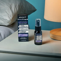Nightstand scene with ONNIT melatonin sleep-support spray