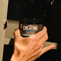 Unflavored vegan creatine monohydrate powder in tub